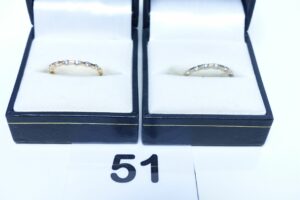 2 anneaux en or 750/1000 ornés d'un rang de petits dimants (Td52). PB 2,9g