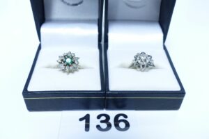 2 bagues en or 750/1000 (1 ornée d'une pierre Td48)(1 ornée d'une pierre verte entourage petits diamants Td47). PB 7,5g