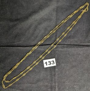 1 Sautoir maille filigranée et sa petite croix decorative (L152cm) en or 750/1000 18k. PB 29,9g