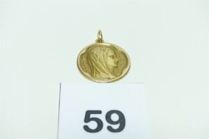 1 Médaille de la Verge en or 750//1000, (diamètre 2,7cm). PB 10,8g