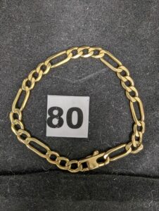 1 Bracelet maille gourmette alternée (L 22cm)en or 750/1000 18k. PB 18,2g