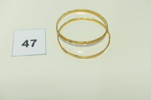 2 bracelets rigides ouvragés en or 750/1000 (diamètre 6,5cm). PB 29,7g