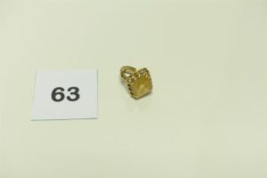 1 Bague en or 750/1000 ornée d'une grosse pierre jaune (Td51). PB 9,2g