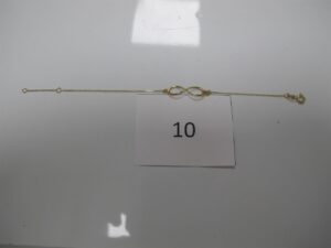 1 Bracelet en or 18k(750/1000)motif infini(L18cm).PB 1,16g.