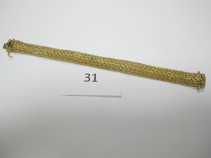 1 Bracelet en or 18k(750/1000)maille plate(L19cm).PB 17,47g.