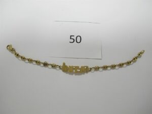 1 Bracelet en or 18k(750/1000)maille grains de café avec prénom "Inaya"(L15cm).PB 5,60g.