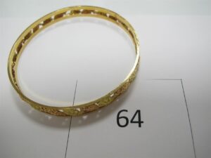 1 Bracelet en or 18k(750/1000)motifs grappes de raisins(D7cm).PB 14g.