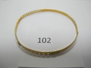 1 bracelet en or 18k(750/1000)ancien ajouré avec motifs(D7cm).PB 8,70 g.