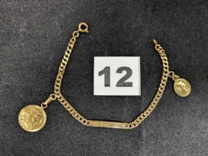 1 Bracelet d'identité orné de deux médailles de la vierge (L16cm), fermoir en 9k, le reste en 750/1000 18k. PB 9,1g
