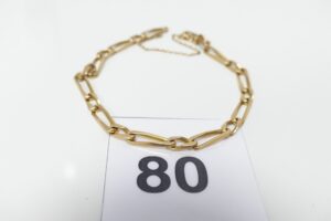 1 bracelet maille alternée en or 750/1000 avec chaînette de sécurité (L20cm). PB 10,1g