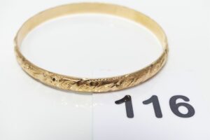 1 Bracelet rigide et ouvragé en or 750/1000 (diamètre 6,5cm). PB 11g
