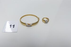 1 bracelet (diamètre 5/6cm) et 1 bague (Td59, monture creuse). Le tout en or 750/1000 et motif central en croix orné de pierres. PB 13,6g
