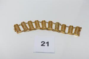 1 bracelet maille articulée et filigranée en or 750/1000 avec chaînette de sécurité (L17cm, fermoir à vis). PB 29,5g