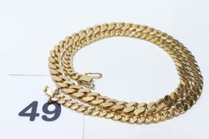 1 Collier maille gourmette en or 750/1000 18k (L45cm). PB 52,8g
