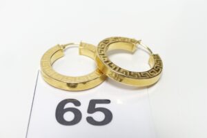 1 Paire de créoles ouvragées et creuses en or 750/1000 18k (diamètre 2,5cm). PB 4,7g