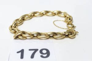 1 Bracelet maille tressée en or 750/1000 18k, avec chaînette de sécurité (fermoir abimé, petits chocs, L20cm). PB 14,5g