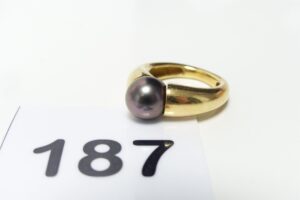 1 Bague en or 750/1000 18k sertie d'une perle grise de Tahiti (td54). PB 8,9g