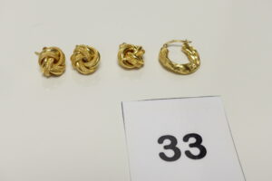 1 Paire de boucles, 1 pendentif assorti et 1 créole cabossée. Le tout en or 750/1000 18k. PB 5,5g