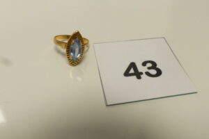 1 Bague en or 750/1000 18k, serti-griffes une pierre bleue ciel (td52). PB 3,6g