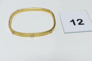 1 Bracelet rigide ouvrant à décor de vis en or 750/1000 18k (diamètre 5/5,5cm). PB 11,7g