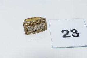 1 Bague en or 750/1000 18K ornée de petites pierres (quelques chatons vides, td55). PB 8g
