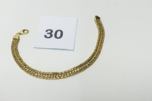 1 Bracelet en or 375/1000 9k centré d'un rang de petites pierres blanches (L18cm). PB 6g