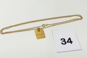 1 chaîne maille gourmette (L64cm) et 1 pendentif plaque gravée. Le tout en or 750/1000 18k PB 9,8g