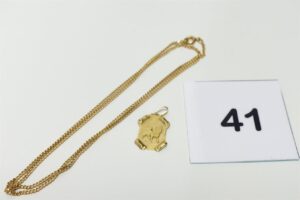 1 chaîne maille gourmette (l48cm) et 1 pendentif signe du lion. Le tout en or 750/1000 18k PB 5,8g
