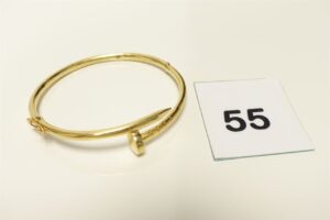 1 Bracelet en forme de clou, or 750/1000 18k (fermoir à restaurer, diamètre 6cm). PB 8,9g
