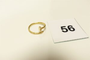1 Bague en forme de clou en or 750/1000 18k ornée d'un petit rang de petites pierres (td60). PB 2,3g