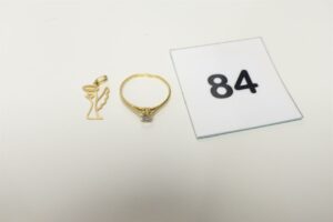1 bague ornée d'une petite pierre (td54) et 1 pendentif à décor d'un ange. Le tout en or 750/1000 18k PB 1,8g