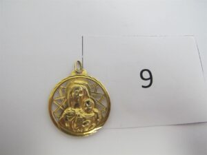 1 Médaille en or 18k(750/1000)à double motif(vierge et christ).PB 4g.