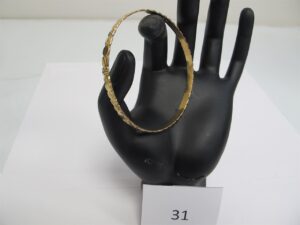 1 Bracelet rigide ouvragé or 18k(750/1000)(D6,5cm).PB 13,67g.