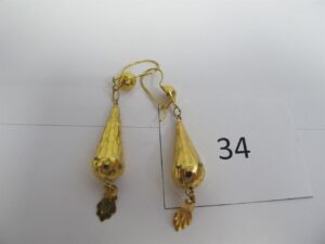 2 Pendants or 21 k (875/1000)motif boules.PBT 4,57g.