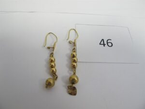 2 Pendants or 18 k (750/1000)motif boules.PBT 4,95 g.