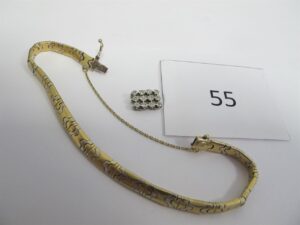 1 Bracelet alliage 14k(585/1000)articulébicolore avec chainette de sécurité (D7cm), 1 bris d'or 18k(750/1000)or grispavé de ptes pierres blanches.PBT 17,43g(PB alliage 14k(585/1000)16,18g/PB or 18k(750/1000)1,24g).