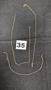 1 Chaine sectionnée (débris) maille forçat et 1 bracelet cassé en maille ornée de pierres. Le tout en or 750/1000 18k.PB 6,14g