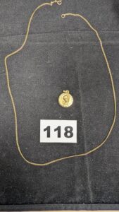 1 Chaine maille gourmette (L50cm) et 1 médaille angelot (L2cm). Le tout en or 750/1000 18k. PB 5,38g