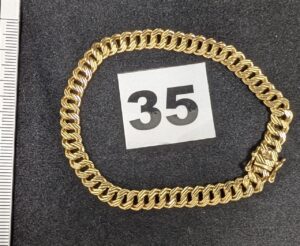 1 Bracelet fin maille américaine (L18cm) en or 750/1000 18k. PB 15,53g