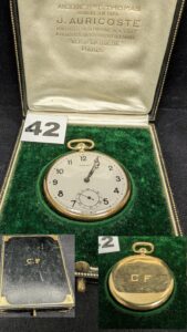 1 Montre de gousset de marque J. AURICOSTE, boitier gravé CF au verso , en or 750/1000 18k. PB 50,2g avec sa boite d'origine