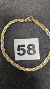 1 Bracelet tressé 3 ors (L18cm) en or 750/1000 18k. PB 2,98g