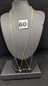 1 Chaine maille forçat, 1 chaine maille marine, et 2 pendentifs motif étoile et coeur, le tout en or 750/1000 18k. PB 5,27g