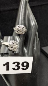 1 Bague rehaussée de petits diamants (TD50) en or gris 750/1000 18k. PB 2,08g