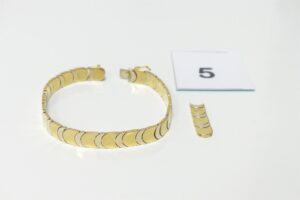 1 Bracelet maille articulée en or 750/1000 (+ 1 rallonge)(L18cm). PB 31,8g