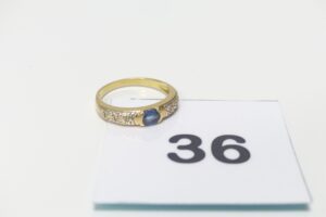 1 bague en or 750/1000 18k ornée d'une pierre bleue et petits diamants (Td54). PB 3,2g