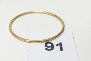 1 Bracelet jonc en or 750/1000 18k (diamètre 5,5cm). PB 14,6g