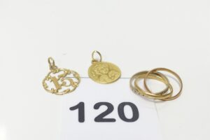 1 alliance 3 brins 3 ors (td48), 1 médaille à décor d'un ange et 1 pendentif chiffre "13". Le tout en or 750/1000 18k PB 5,9g