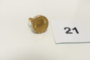 1 Bague en or 750/1000 motif central à décor d'un lion (Td55). PB 5g