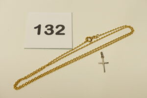1 Chaîne maille jaseron (Longueur 48cm) et 1 petite croix, le tout en or 750/1000 (18K). PB 3,3g