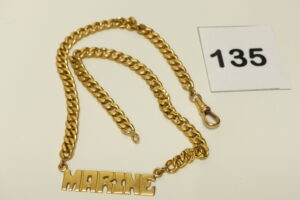 1 Collier maille gourmette en or 750/1000 (18K, abimé) motif central à décor du prénom "MARINE" (Longueur 42cm). PB 19g